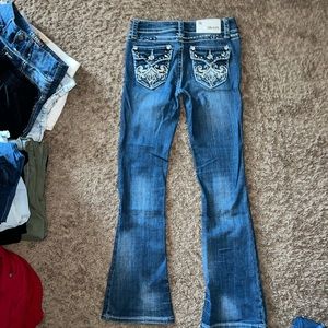 2 pairs of grace jeans w design pockets